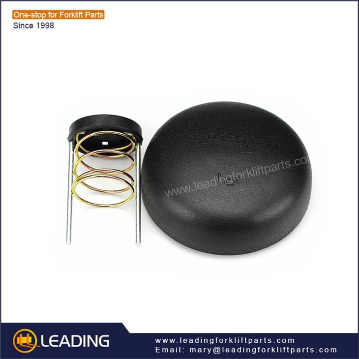 Forklift steering wheel horn